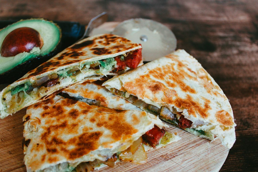 Easy chicken quesadillas cut into wedges