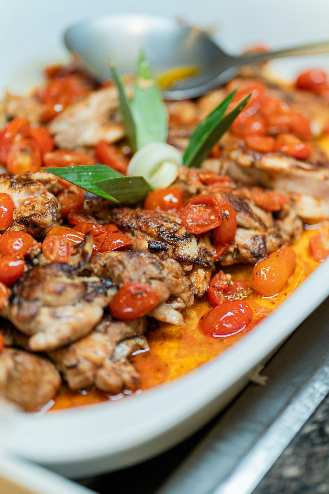 Chicken with tomatoes and herbs for a creamy Tuscan-style skillet dinner